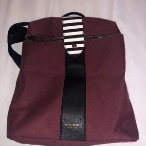 Canvas burgundy backpack with single top zipper